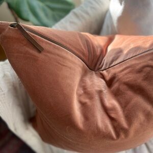 Pottery Barn Everywhere velvet pillow cover in cognac